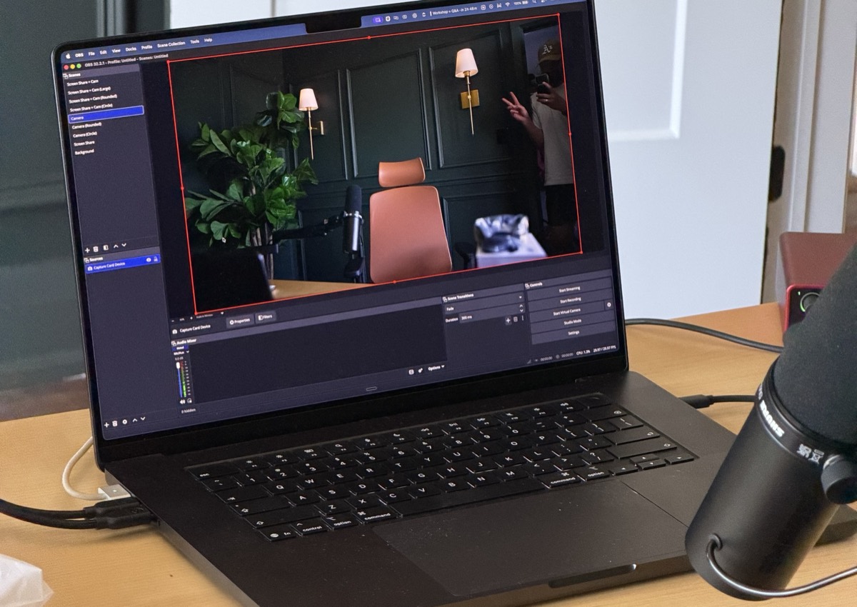 A laptop running OBS showing the studio camera framing